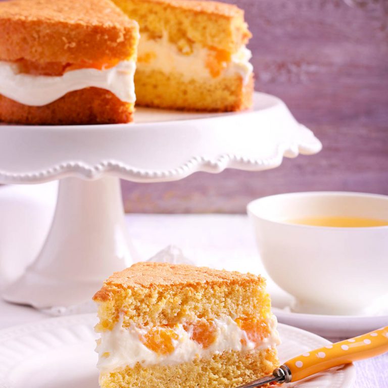 Orange Victoria Sponge Cake with orange buttercream filling