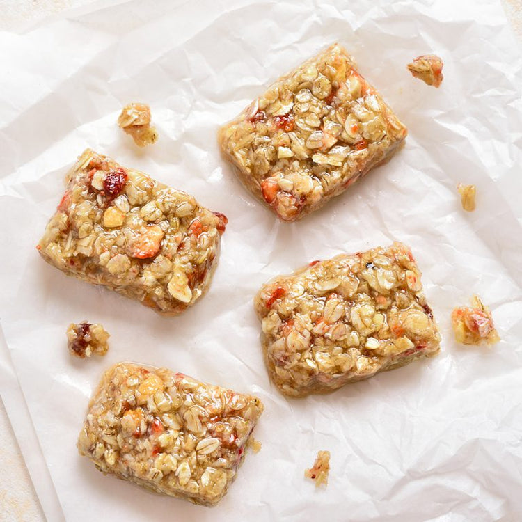 Raspberry Ripple White Chocolate Flapjacks on a baking tray