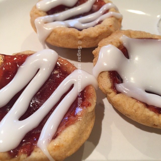 Raspberry Jam Tarts with Cherry Bakewell Drizzle